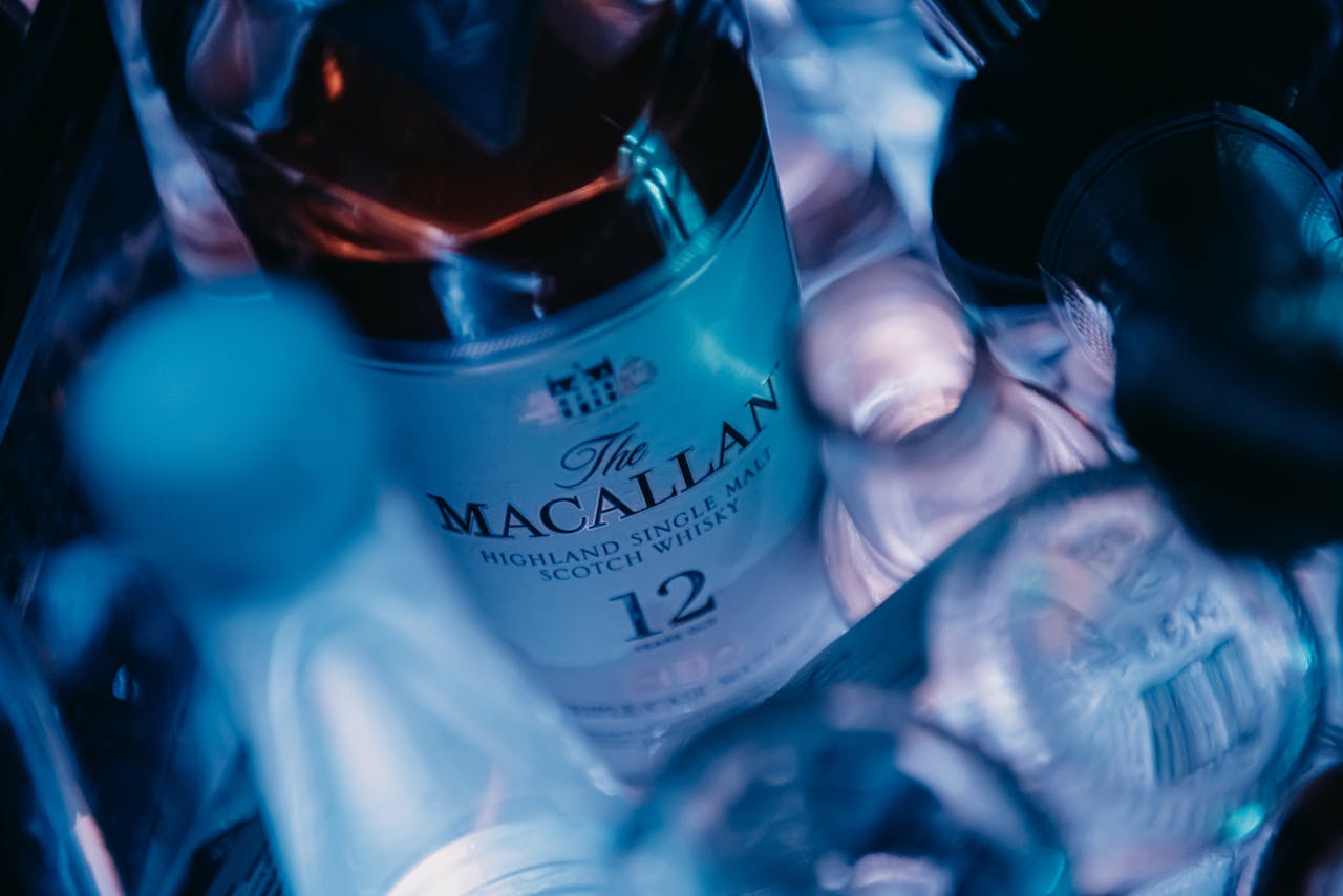 digital-01 Close-up of The Macallan 12 Year Scotch Whiskey bottle, emphasizing luxury and indulgence.