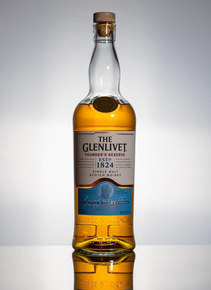 creative-01 High-quality studio shot of The Glenlivet Founders Reserve whisky bottle.